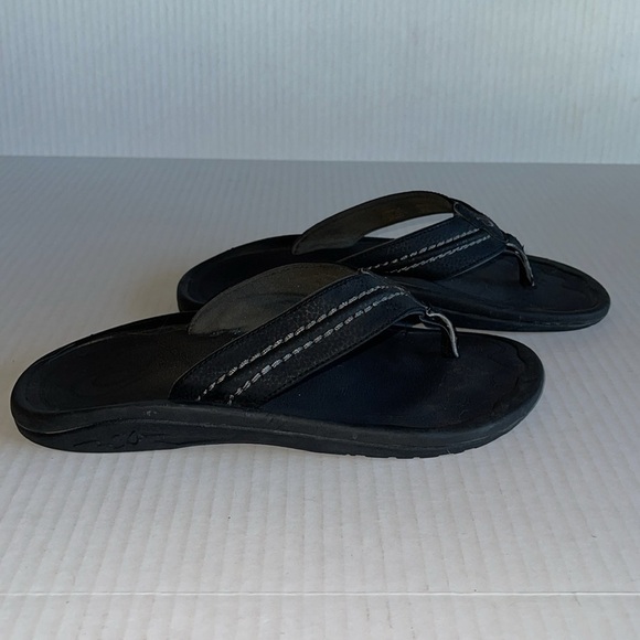 Olukai Black Hokua Flip Flop Sandals - Picture 6 of 11